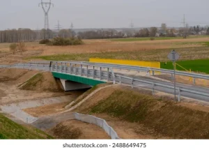 NUEVO PUENTE SOBRE DESAGÜE DESCARGADOR